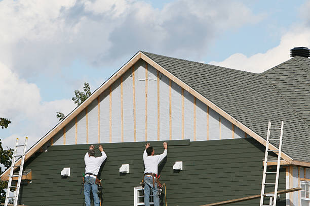 Professional Siding Installation technician working in Danville, IL